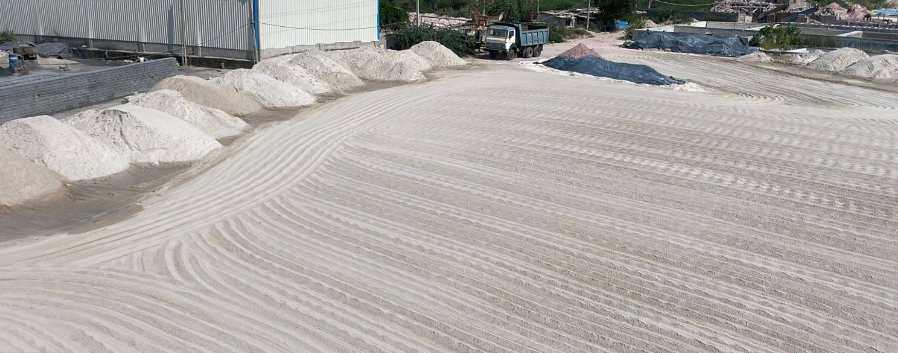 Processed minerals and stockpiles at site